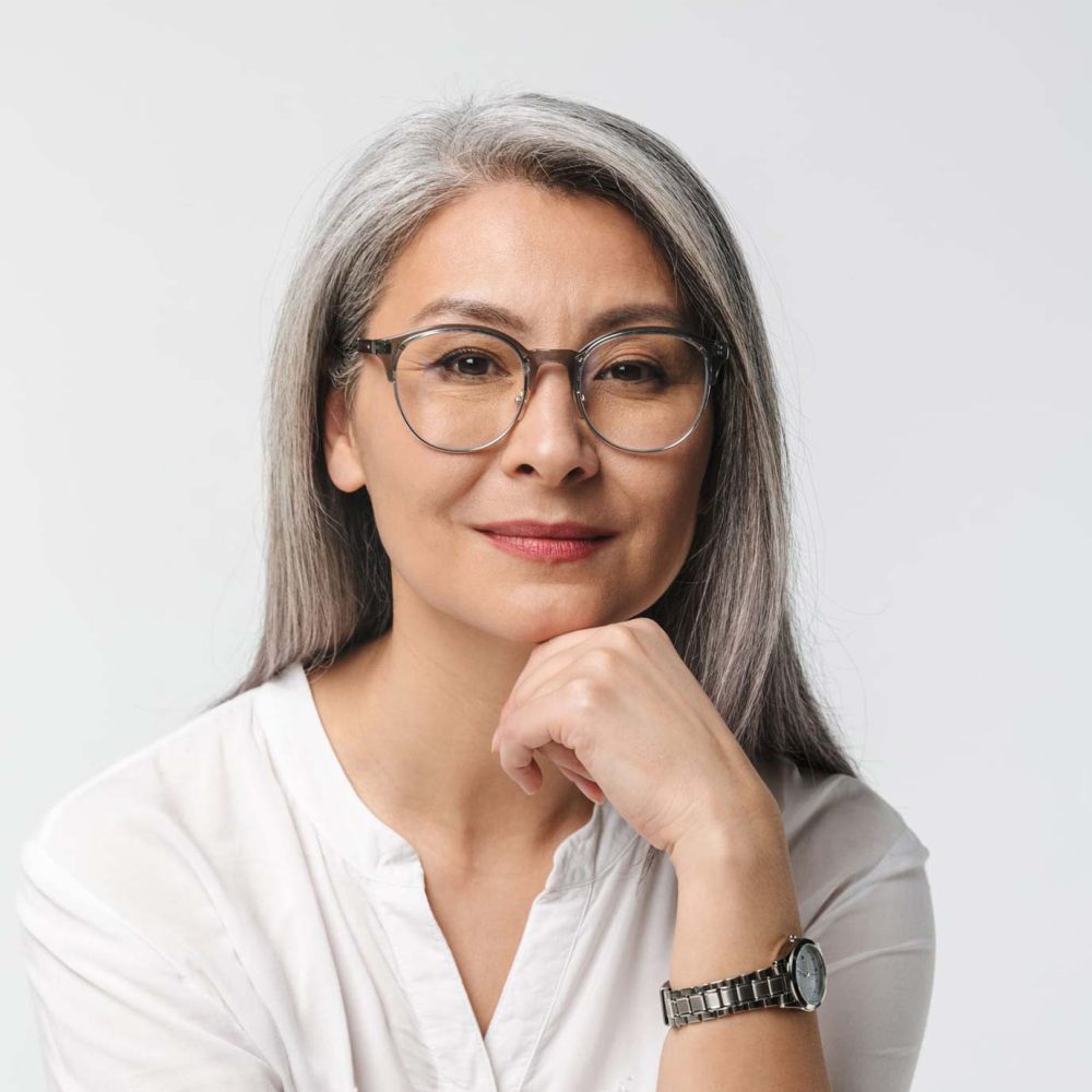 2-image-of-adult-mature-woman-wearing-eyeglasses-and-JYDDTGU.jpg